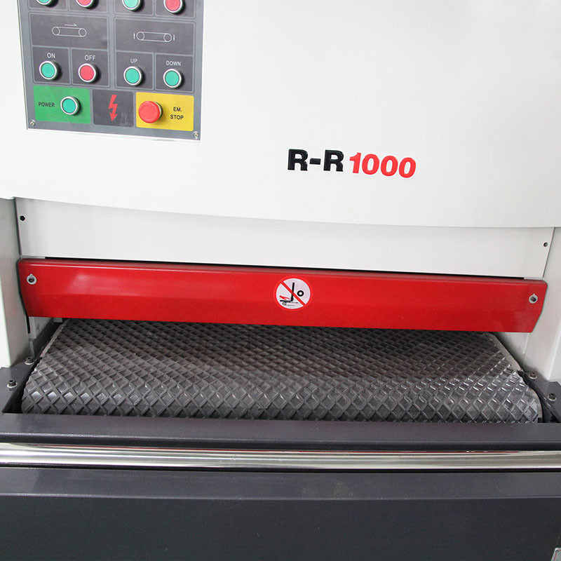 الحزام الرملي الآلي Rr1000mm الشريحة العاملة العريضة المعدن الرملية آلة إزالة الحزام البوليس